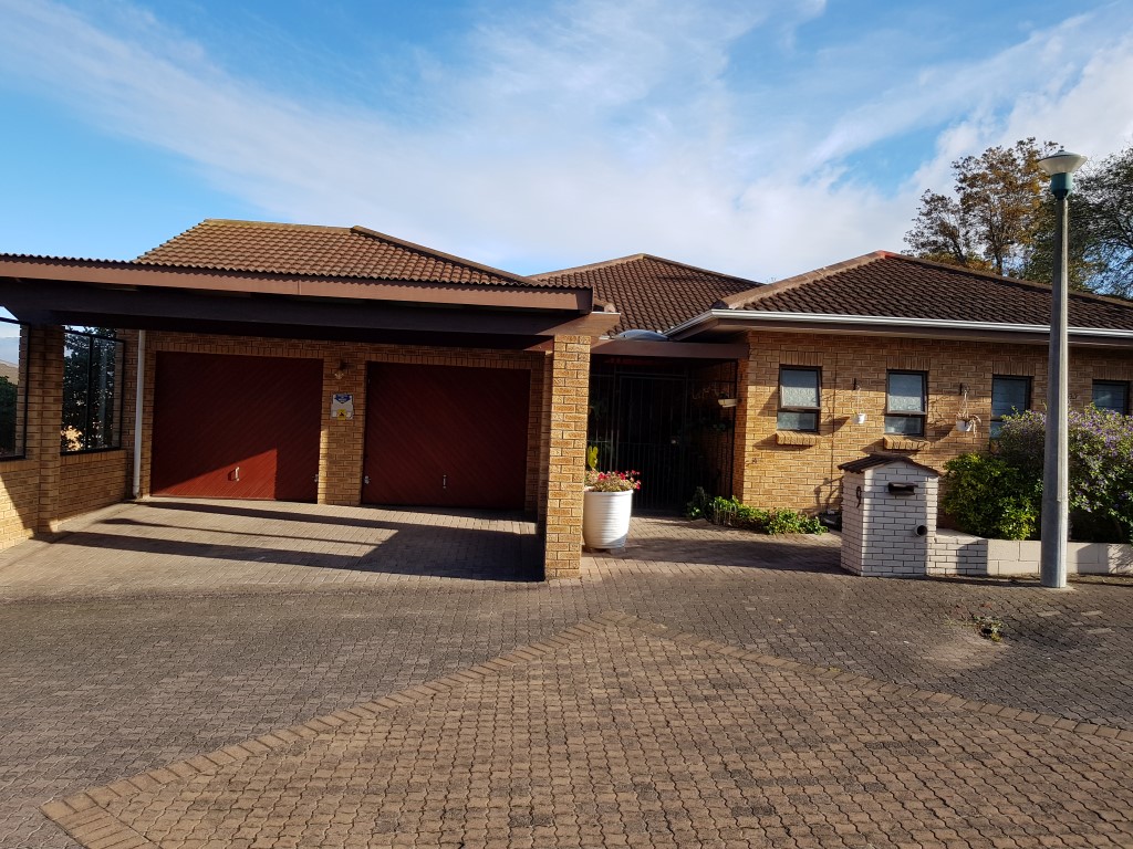 Front of House with Double Garage and Double Car Port
